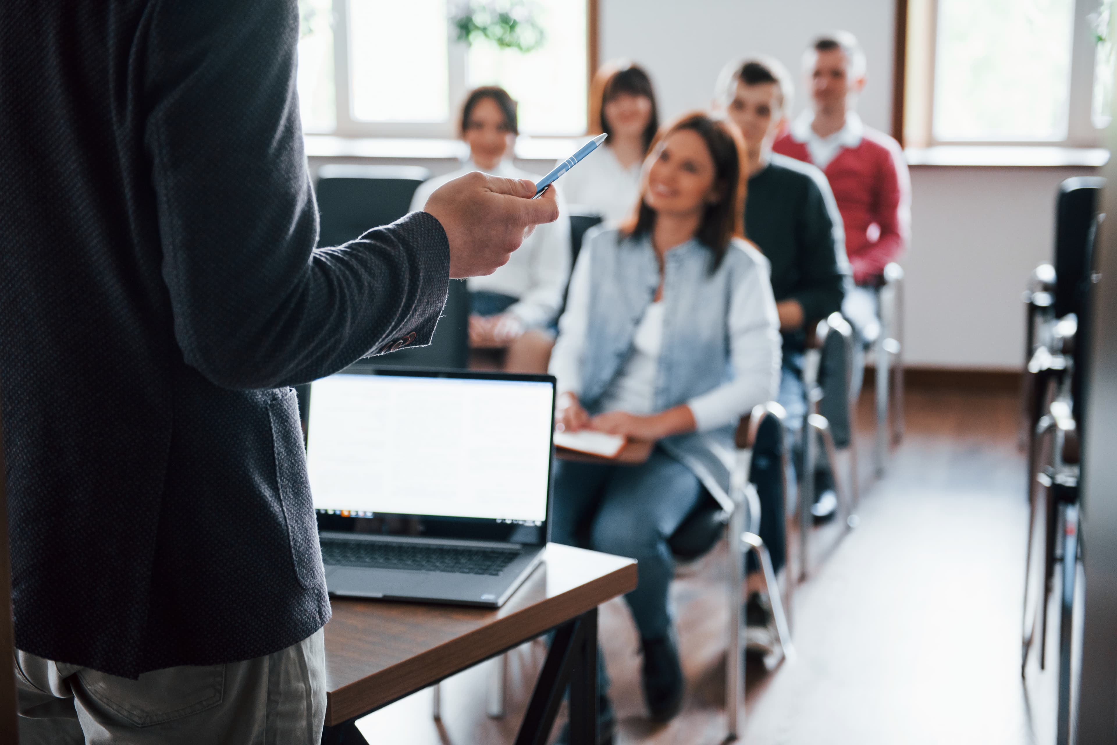 Professionals participating in a training conference